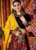 Woman in traditional Indian attire with a colorful background