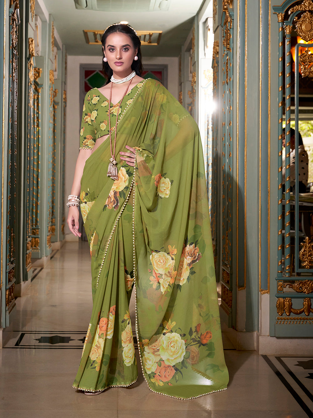 Mehendi green georgette saree with printed border