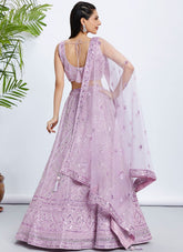 Lavender Net Engagement Lehenga Choli with Cutdana, Sequins & Zarkan Embroidery