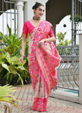 Elegant pink Patola saree for wedding guest wear