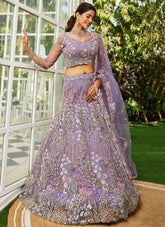 Mauve net bridal lehenga with burgundy sequin and coding-thread embroidery
