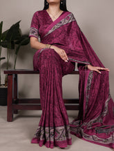 Magenta pink crepe saree with all-over print