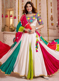 Woman wearing a colorful saree with a traditional setting
