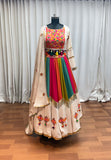 Multilayered flared beige lehenga for Navratri festival nights