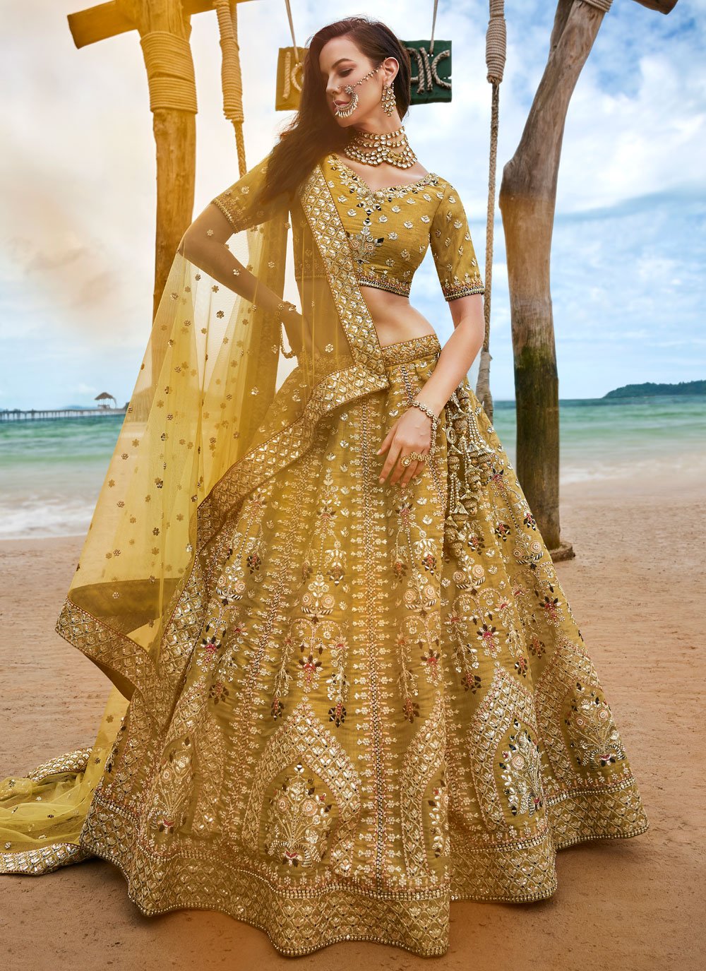 Mustard Bridal Net Sequins, Moti, Mirror and thread embroidery Lehenga choli