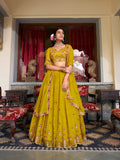 Mustard Color Sequins And Thread Embroidery Work Georgette Lehenga Choli