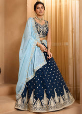 Navy blue embroidered wedding lehenga choli in organza with heavy work