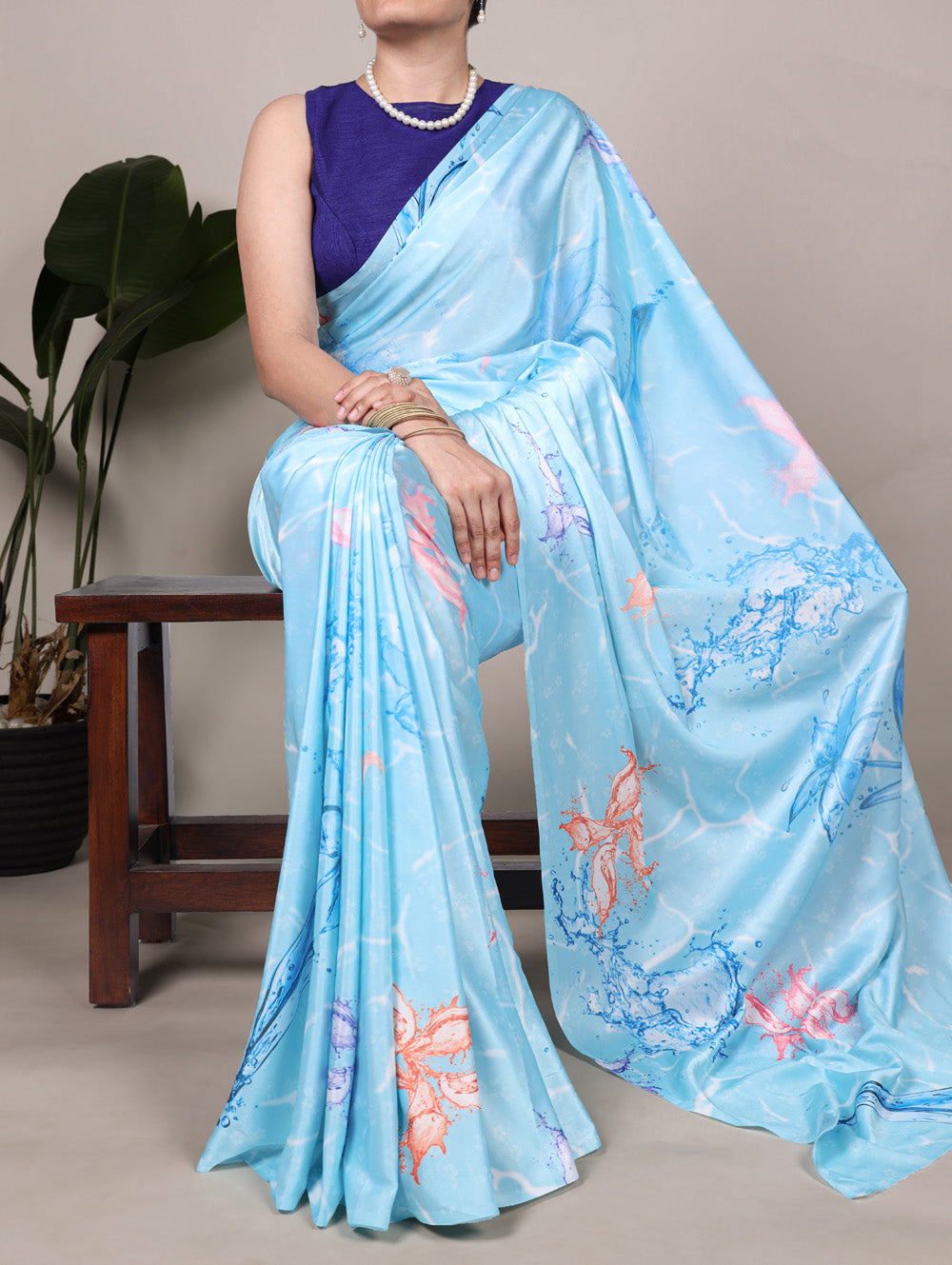 Sky blue satin silk floral printed saree