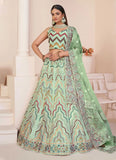 Party Wear Turquoise Net Thread Stone Work Lehenga Choli
