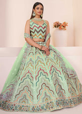 Party Wear Turquoise Net Thread Stone Work Lehenga Choli