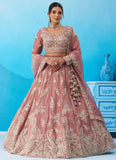 Pink tissue bridal lehenga featuring sequins, coding and thread embroidery with a 4-metre flared silhouette.
