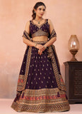 Purple Chinnon Silk lehenga featuring sequins, thread and zari embroidery with a 4-metre flair, matching embroidered dupatta and designer tassels for wedding functions.