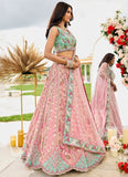 Pink tissue bridesmaid lehenga with sequin and stone embroidery, sweetheart blouse, and net dupatta