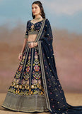 Blue georgette wedding wear lehenga with sequins, zari, dori and multicolor thread embroidery work