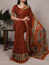 Rust orange crepe saree with all-over print