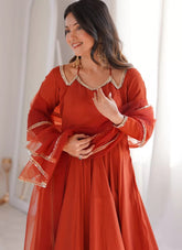 Rust Roman Silk Chanderi Anarkali suit with net dupatta