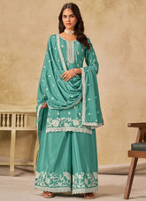 Sea green embroidered Chinnon silk palazzo suit with dupatta