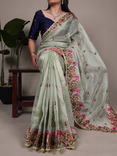 Floral thread embroidered saree in sea green