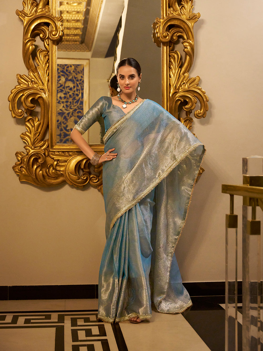 Sky blue zari weaving tissue shimmer saree