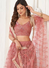 Stunning Dusty Pink Sequins Net Wedding Wear Lehenga With Dupatta