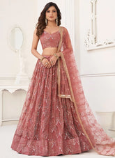 Stunning Dusty Pink Sequins Net Wedding Wear Lehenga With Dupatta
