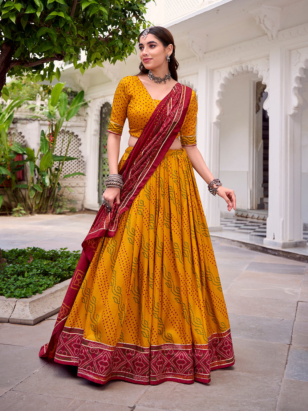 Yellow tasar silk bandhej print lehenga choli