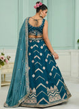 Teal silk bridesmaid wedding lehenga with heavy embroidery