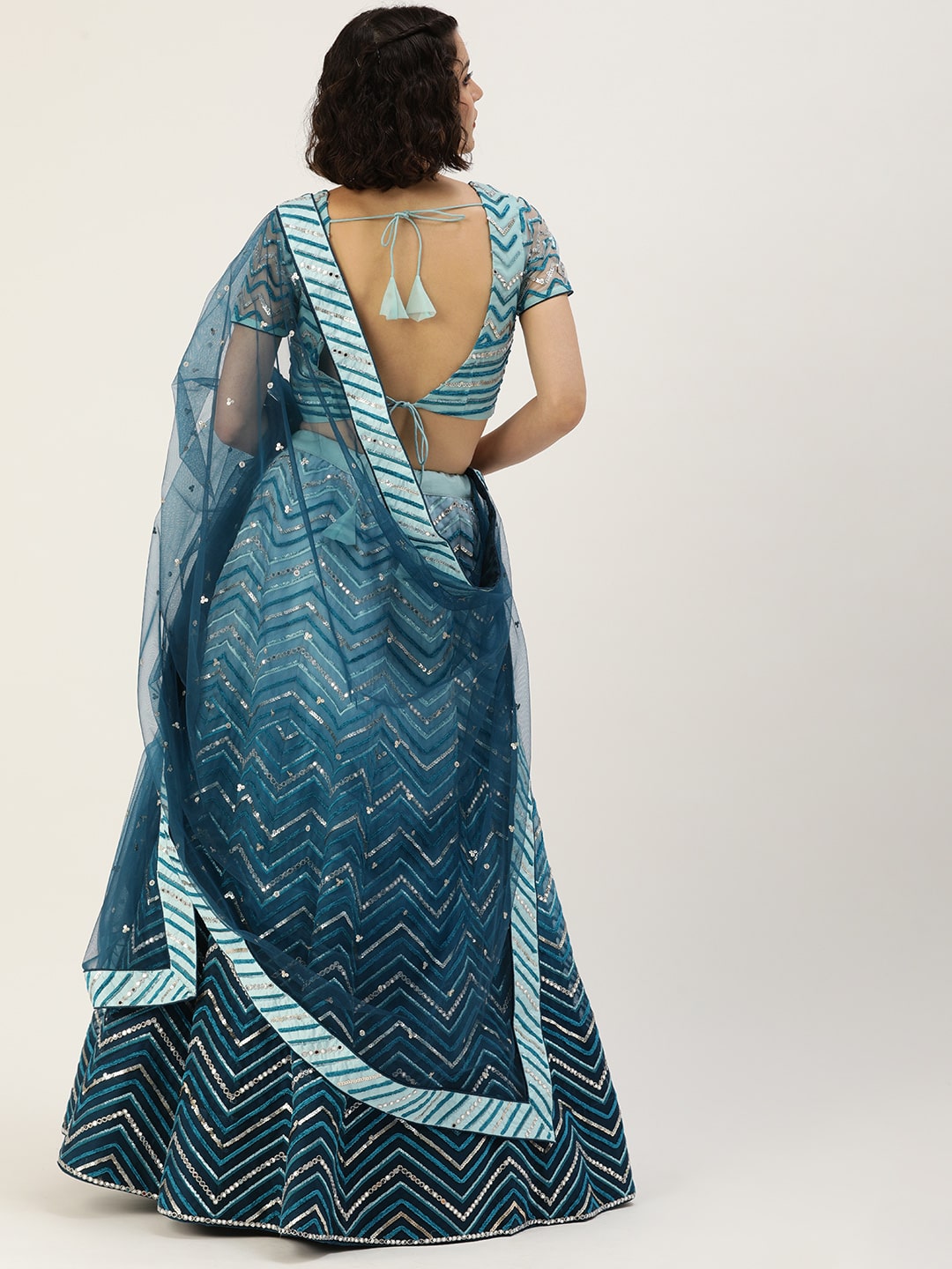 Teal Embroidered Lehenga in Net