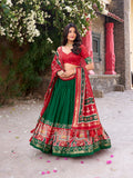 Green Tasar silk lehenga with Patola print and foil work