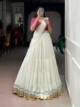 white lehenga with pink bandhej blouse