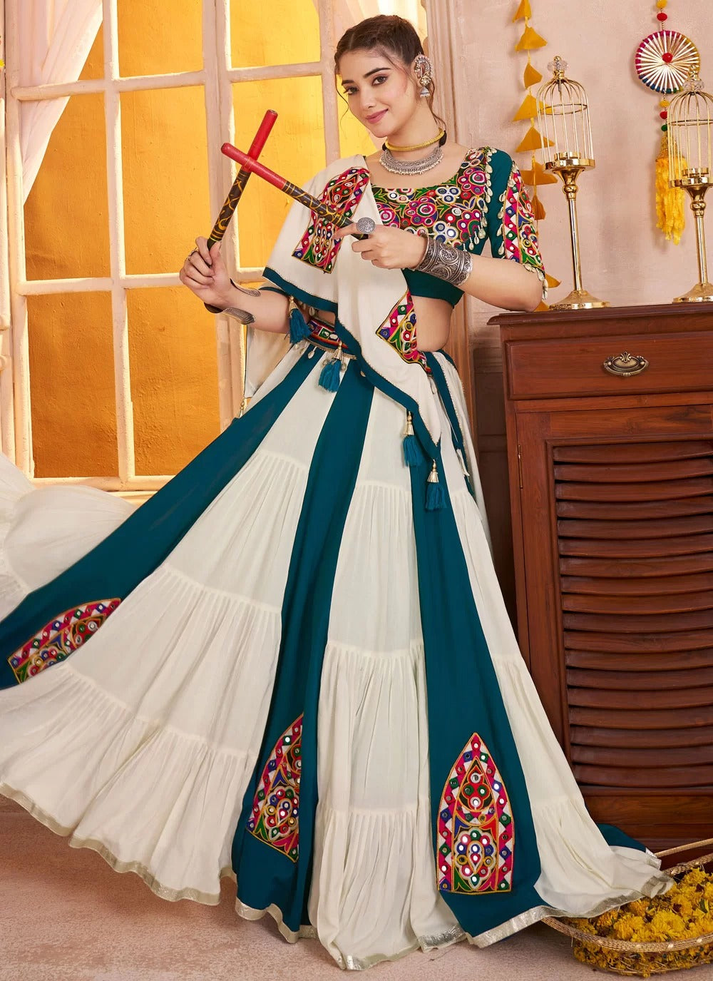 Multi-color Kutchi patch work chaniya choli with teal blouse and white dupatta