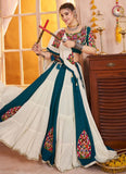 Multi-color Kutchi patch work chaniya choli with teal blouse and white dupatta