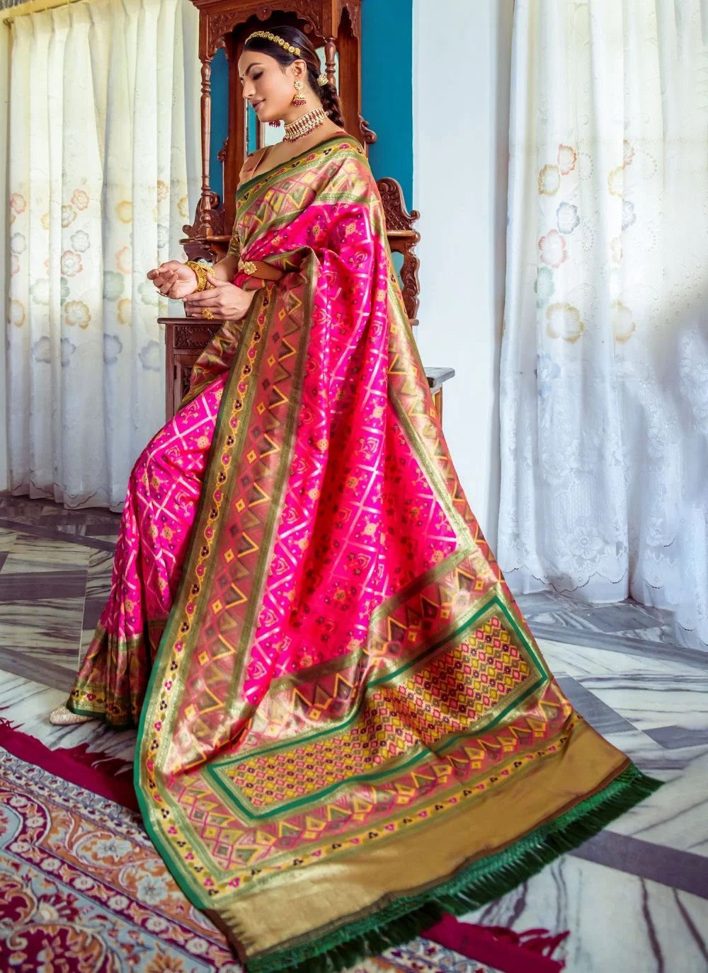 Wedding Wear Patola Woven Art Silk Saree in Magenta
