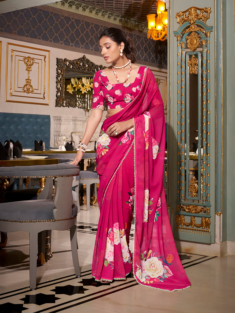Pink georgette saree with pearl lace border