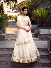 Off-white silver glossy lehenga choli with sequins embroidery