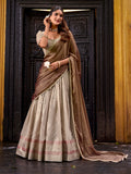 Cream wedding wear lehenga with shimmer dupatta