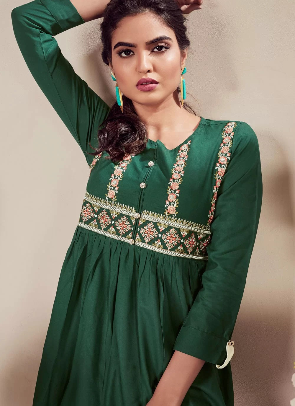 http://gunjfashion.com/cdn/shop/products/green-heavy-reyon-embroidered-short-tunic-top-for-women_1.jpg?v=1670676330