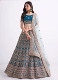 Teal Blue Net Designer Embroidered Lehenga Choli