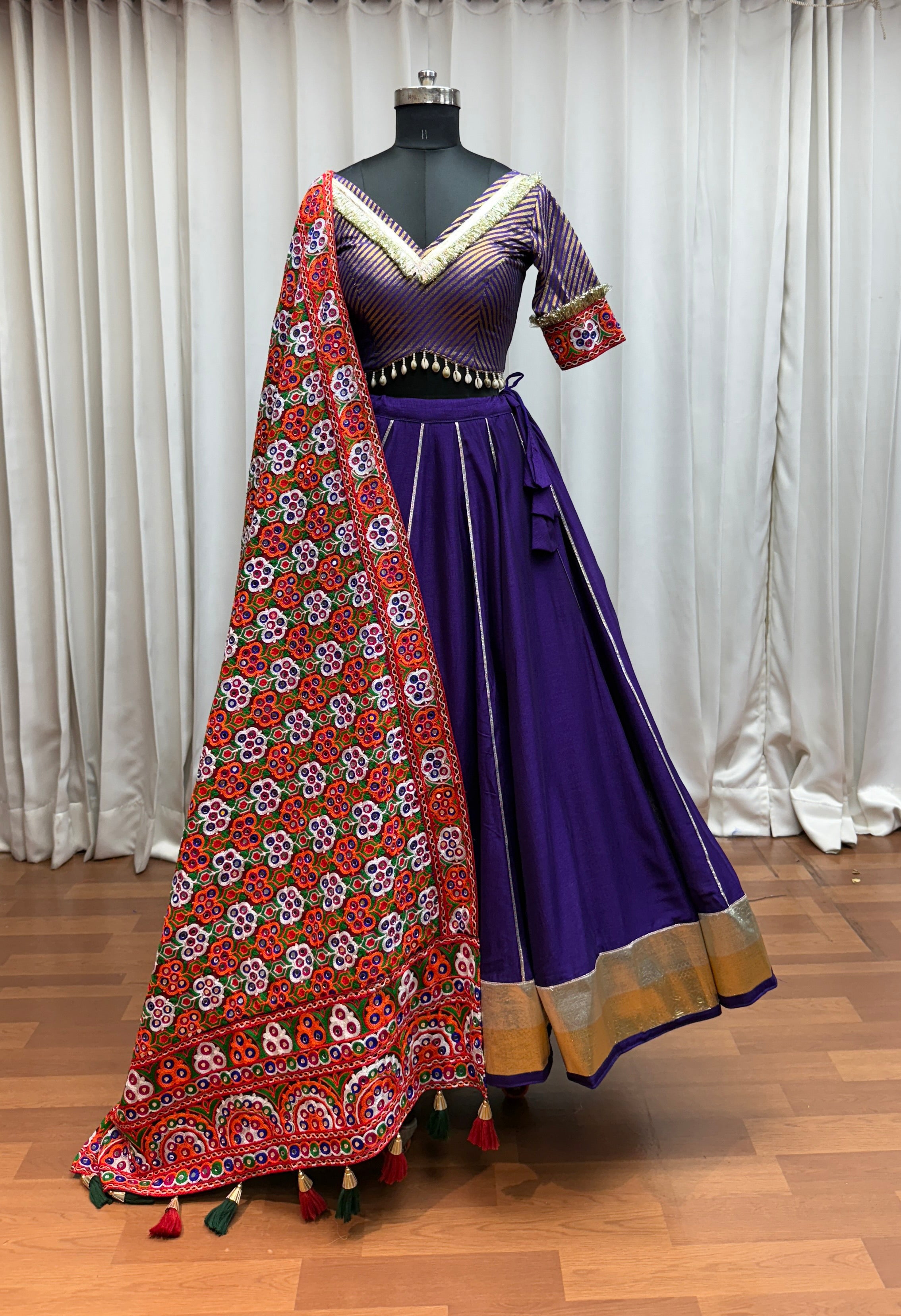Purple Bandhani Inspired Traditional Silk Navratri Lehenga Choli with Green Mirror Work Dupatta