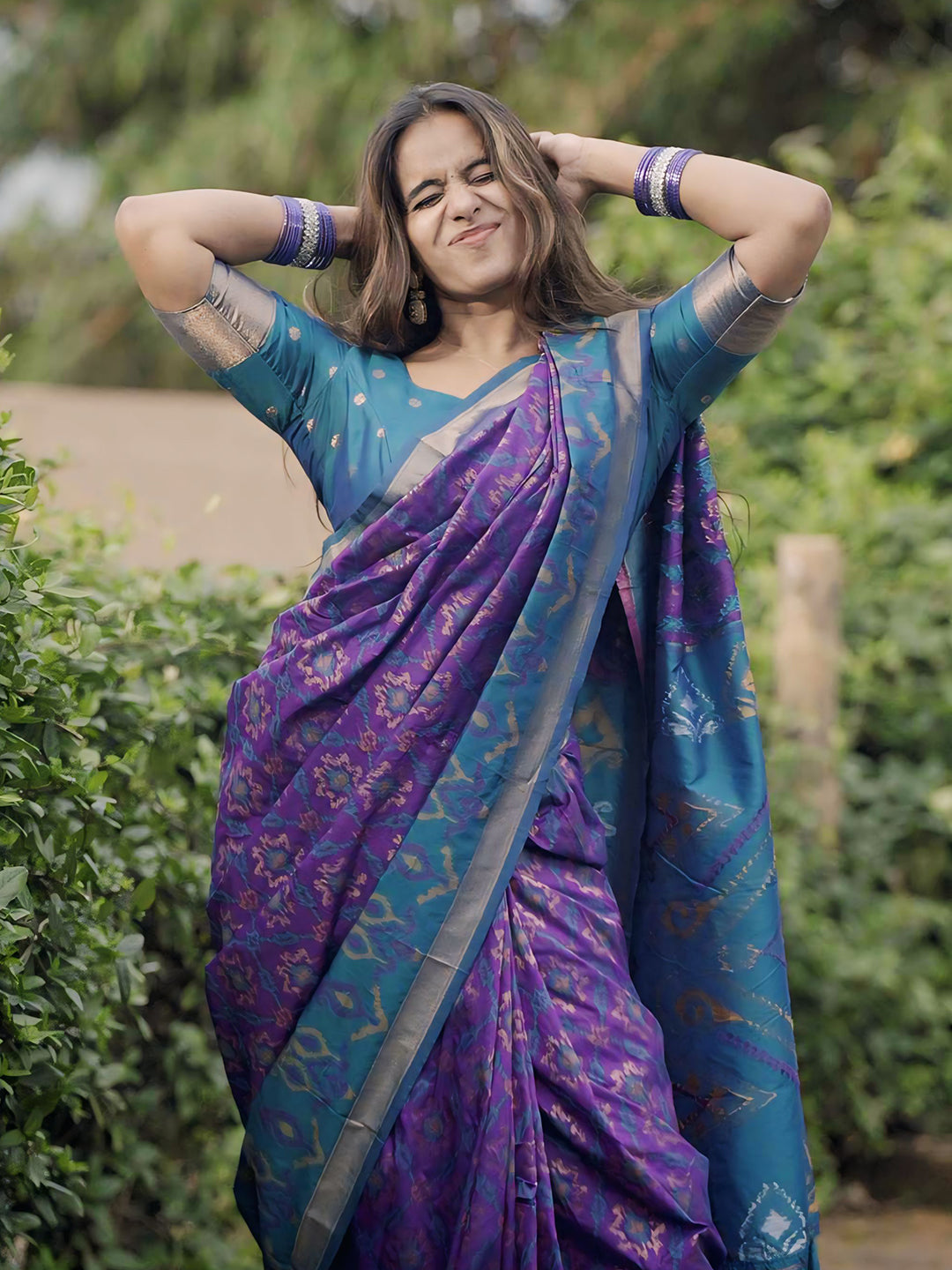 Rupali in our Purple Soft Silk Zari Woven Patola Saree with Contrast Weaves