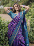 Rupali in our Purple Soft Silk Zari Woven Patola Saree with Contrast Weaves