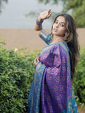 Rupali in our Purple Soft Silk Zari Woven Patola Saree with Contrast Weaves