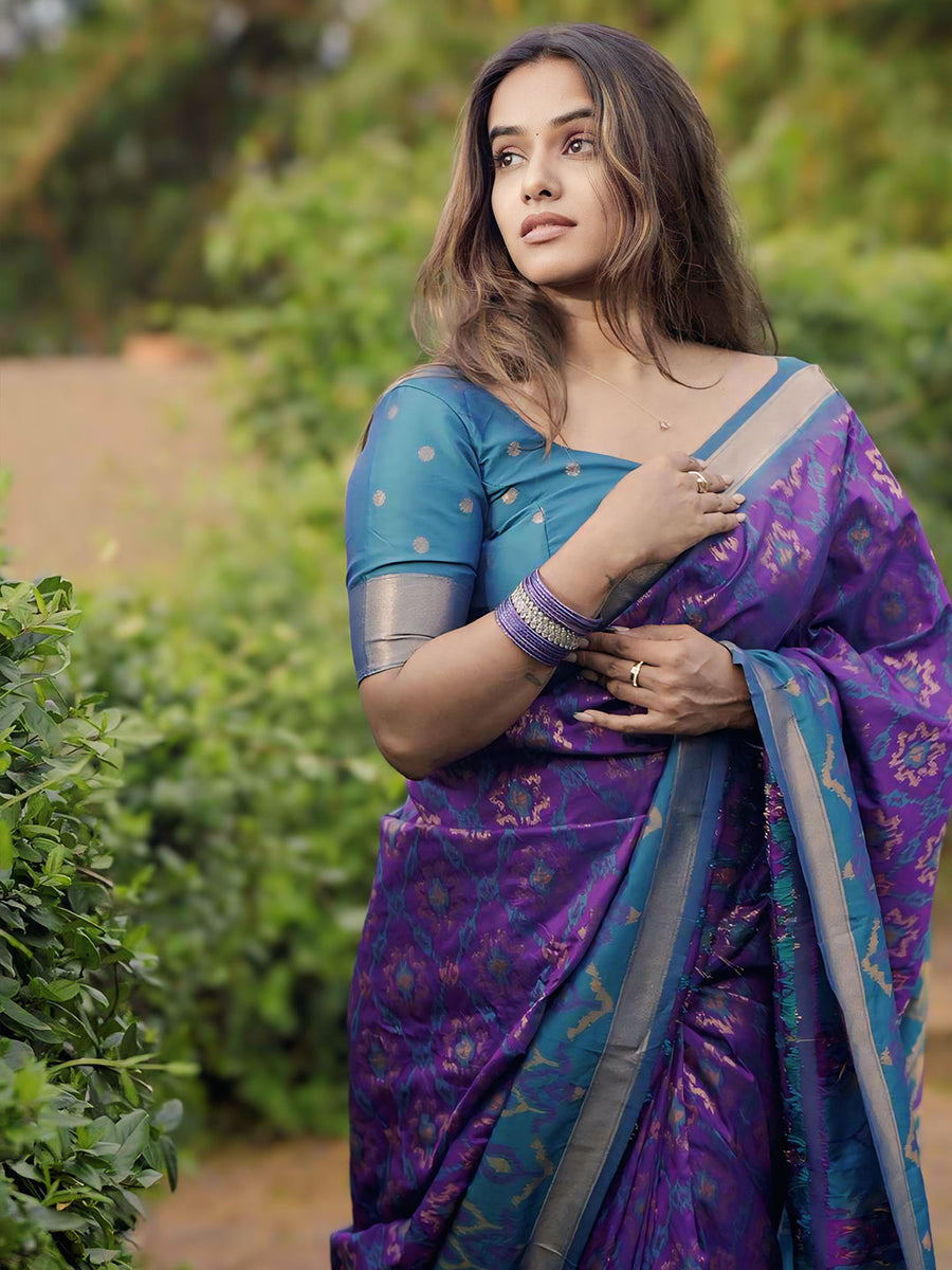Rupali in our Purple Soft Silk Zari Woven Patola Saree with Contrast Weaves