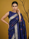 elegant royal blue organza saree featuring zari woven craftsmanship