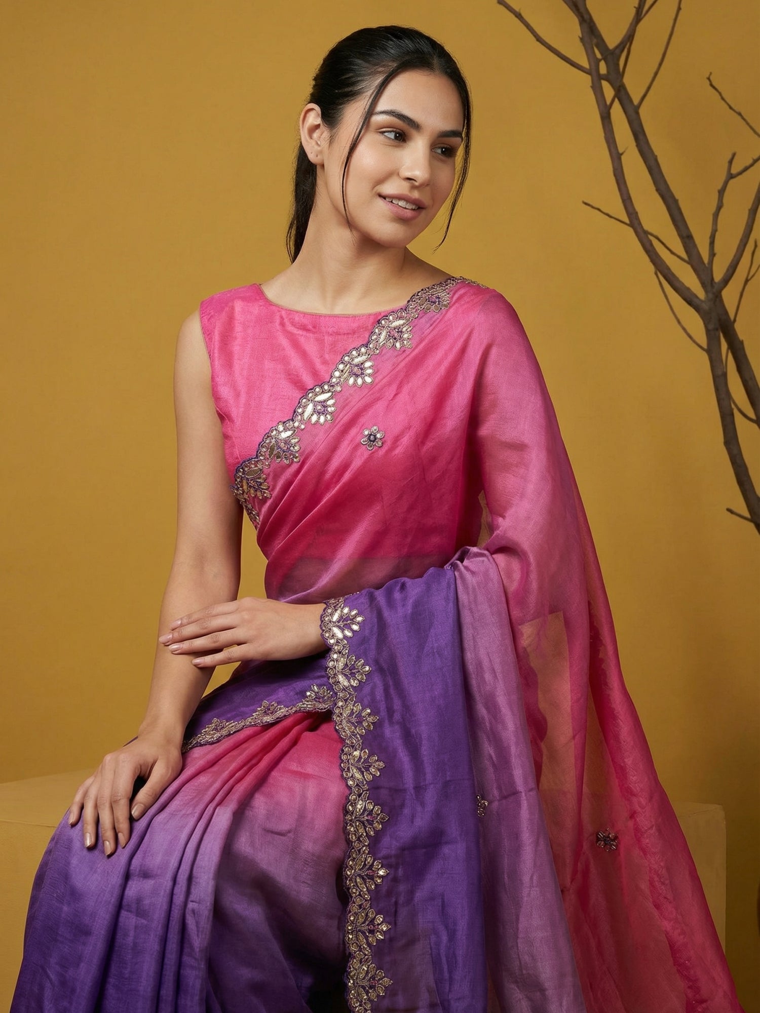 party wear satin saree with smooth drape and handcrafted work