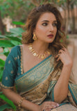 Rupali Bhosle in our Chickoo Pure Tissue Zari Woven Saree with Contrast Weaves
