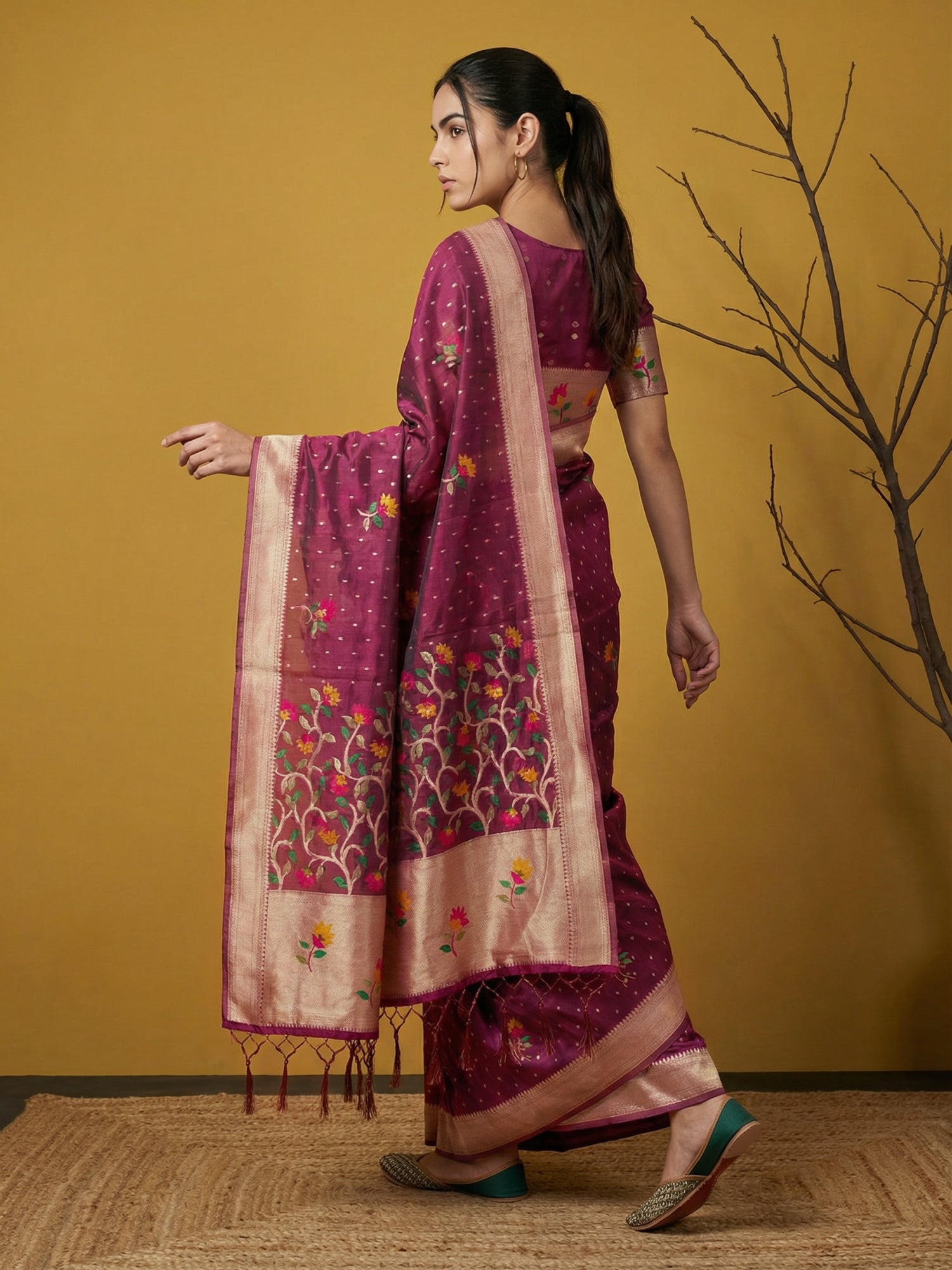 ethnic designer saree with artistic floral weaving and elegant drape