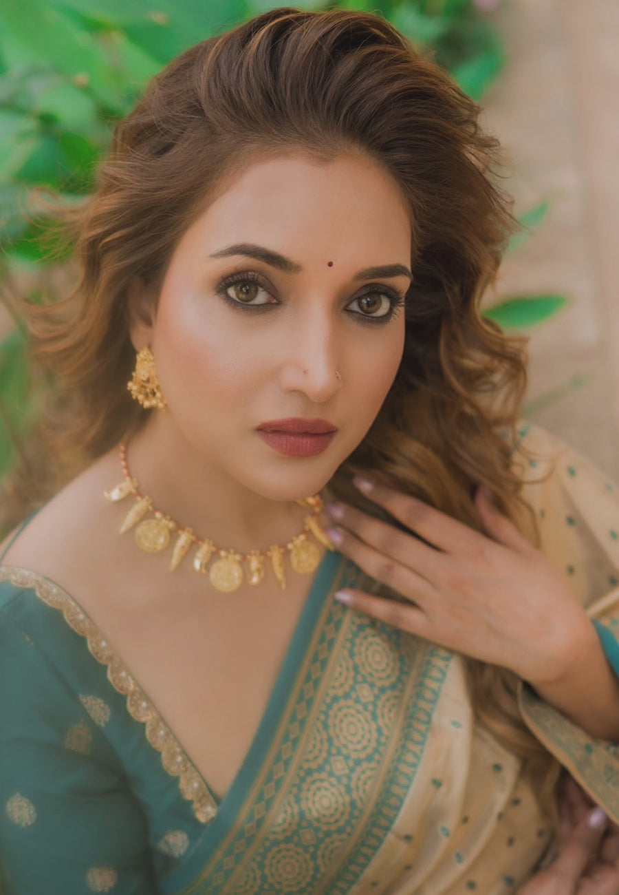 Rupali Bhosle in our Chickoo Pure Tissue Zari Woven Saree with Contrast Weaves