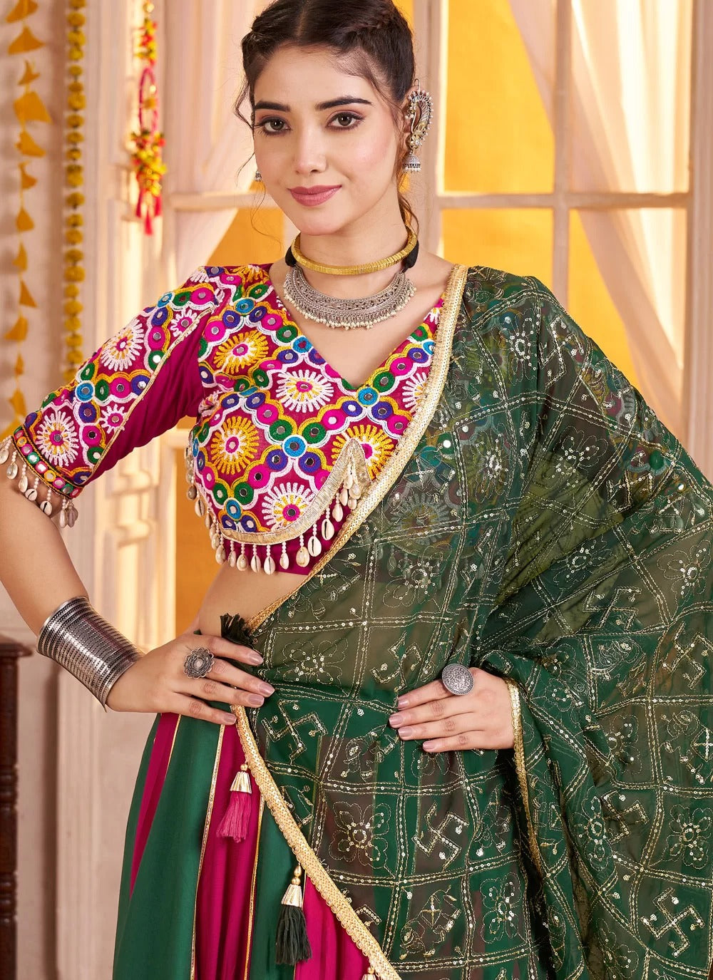 Maroon Kutchi work blouse with mirror and kodi embellishment