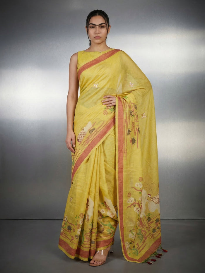 yellow muga cotton saree with resham pencil art pallu